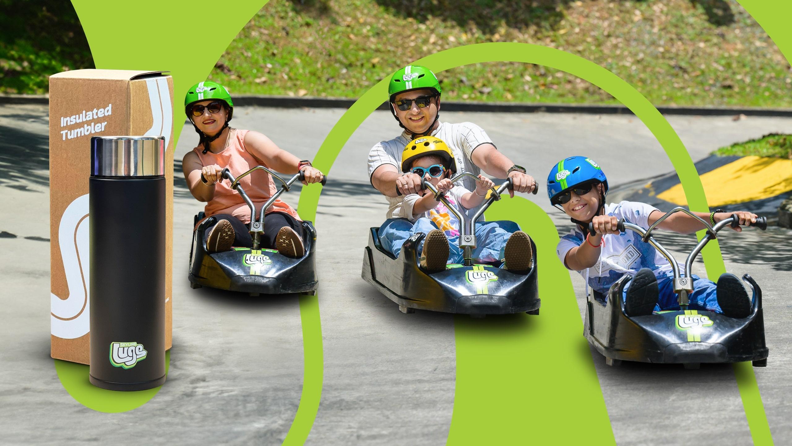 A family rides down the Luge together in Singapore with a promotional Luge flask photoshopped onto the image.