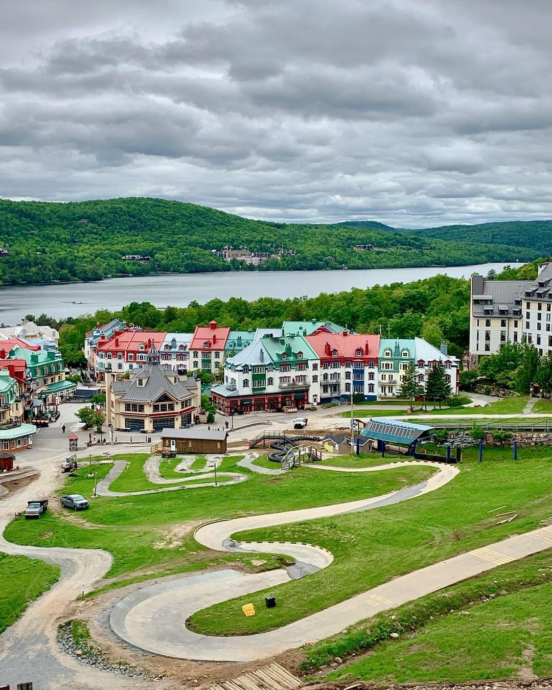 An overview of the Luge tracks with a stunning view of Mont Tremblant behind.